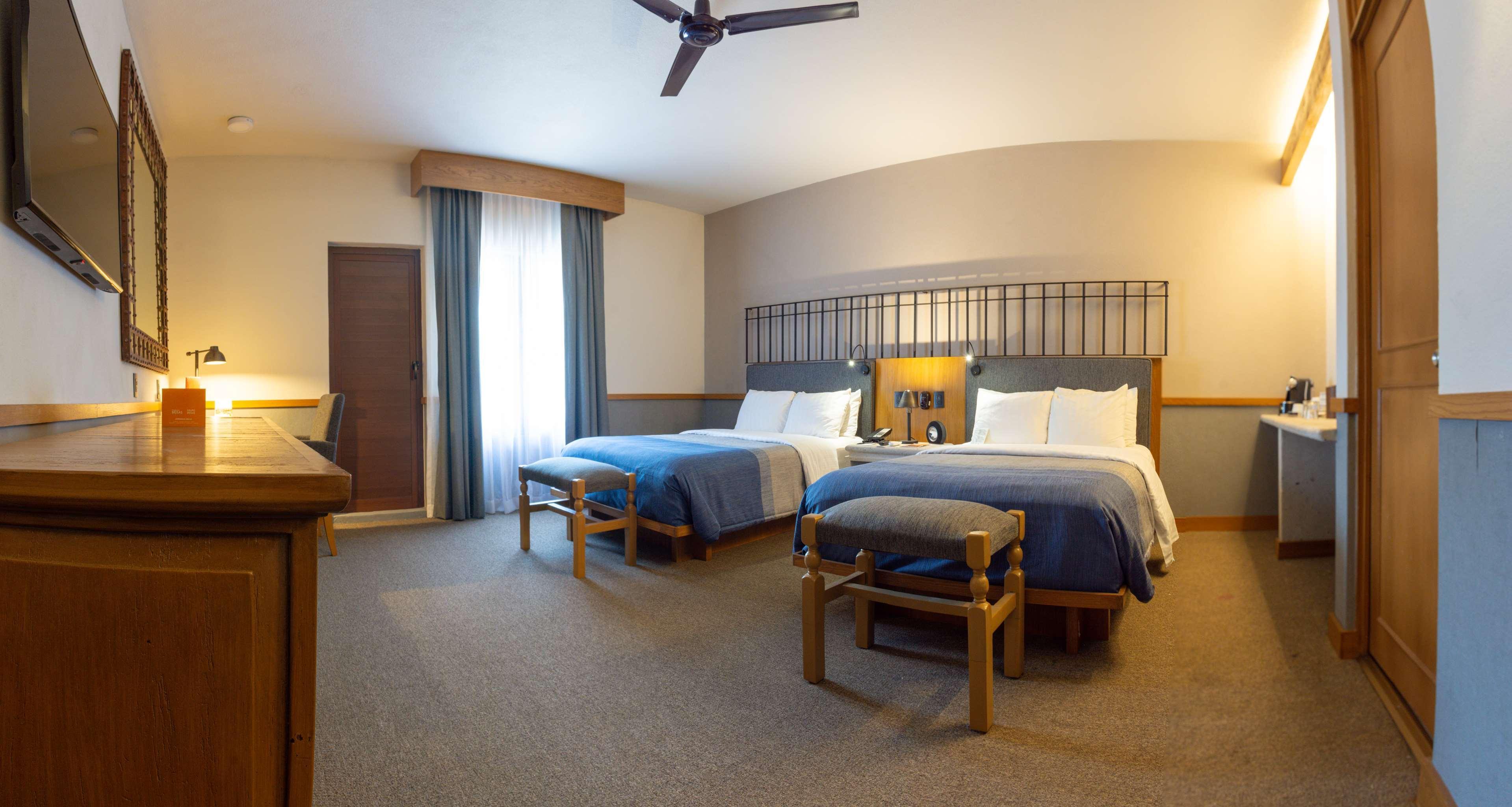 Hacienda Jurica By Brisas Hotel Queretaro Bagian luar foto A room at the Great Wolf Lodge in Grand Opening