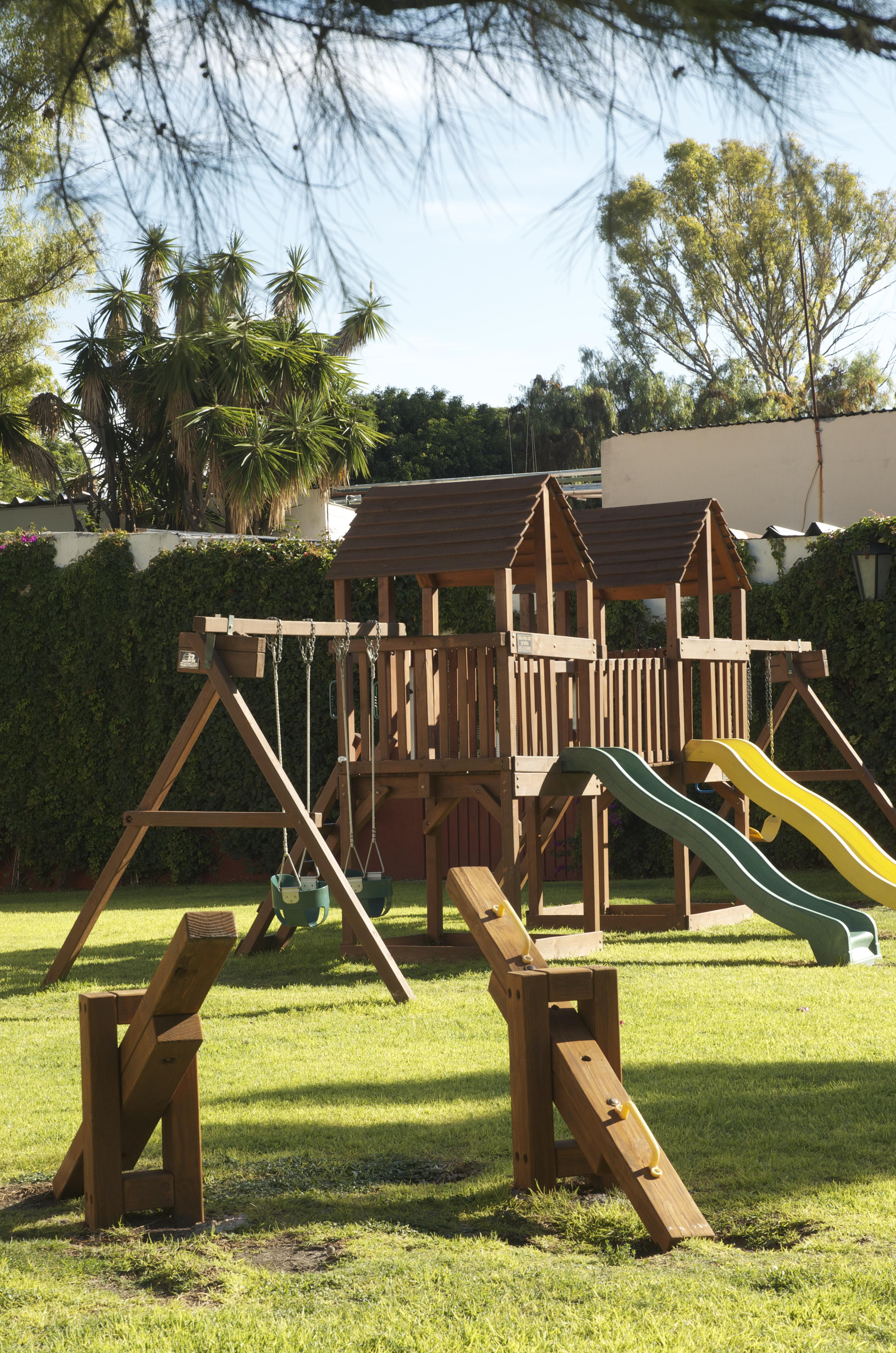 Hacienda Jurica By Brisas Hotel Queretaro Bagian luar foto A backyard playset